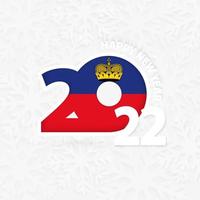 feliz año nuevo 2022 para liechtenstein sobre fondo de copos de nieve. vector