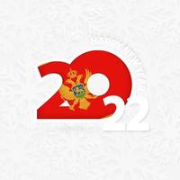 Happy New Year 2022 for Montenegro on snowflake background. vector