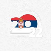 feliz año nuevo 2022 para serbia sobre fondo de copos de nieve. vector