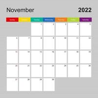 página de calendario para noviembre de 2022, planificador de paredes con diseño colorido. semana comienza el domingo. vector