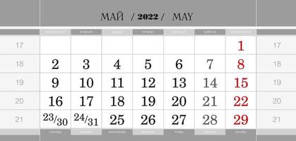 bloque trimestral del calendario para el año 2022, mayo de 2022. calendario de pared, inglés y ruso. la semana comienza a partir del lunes. vector