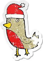 retro distressed sticker of a cartoon christmas robin vector