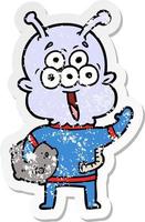 distressed sticker of a happy cartoon alien with moon rock vector