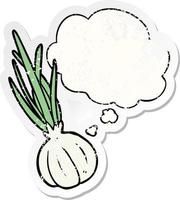 cartoon garlic and thought bubble as a distressed worn sticker vector