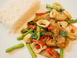 Rice with stir-fried seafood and basil photo