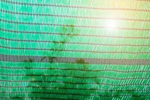 Green Shading Net for protect sun light with tree leaves shadow photo