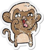 distressed sticker of a crazy cartoon monkey vector