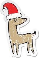 distressed sticker of a cartoon christmas reindeer vector
