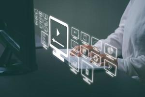 the concept on virtual screen with hands typing on the keyboard photo