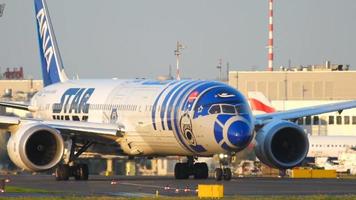 DUSSELDORF, GERMANY JULY 21, 2017 - ANA Boeing 787 Dreamliner in Star Wars livery taxiing before departure. Dusseldorf airport video