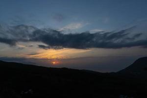 Mountain valley during sunrise. Natural summer landscape photo