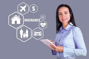 Concept for insurance, home, family, cars, health, travel, money, shopping with an attractive business woman. photo