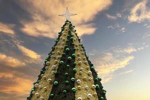 árbol de navidad, árbol de año nuevo afuera en la noche bajo la nieve. foto