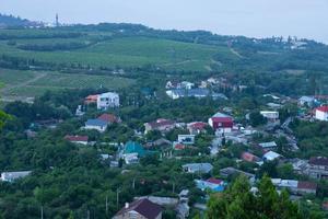 Picturesque mountain European village. View from the top, early in the morning. photo