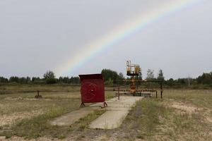 Suspended, frozen, clogged oil well. Copy space. photo