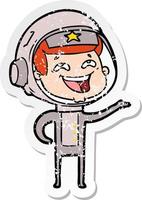 distressed sticker of a cartoon laughing astronaut vector