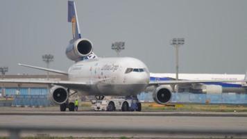 FRANKFURT AM MAIN, GERMANY JULY 19, 2017 - Lufthansa Cargo McDonnell Douglas MD 11 push back before departure. Fraport, Frankfurt, Germany video