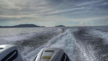 View from the rear of moving speedboat, slow motion, HDR footage video