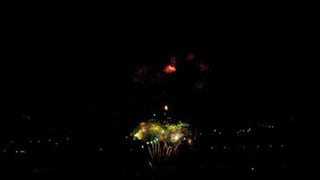 Fireworks flashing in the night sky. video