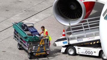 DUSSELDORF, GERMANY JULY 23, 2017 - Air Berlin Airbus 320 at uploading luggage onboard, Dusseldorf Airport, Germany video