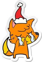 crying fox sticker cartoon of a wearing santa hat vector