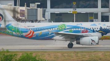 PHUKET, THAILAND NOVEMBER 30, 2016 - Bangkok Airways Airbus 320 HS PGW named Samui taxiing before take off. View from the top floor of the hotel Centara Grand West Sands Resort Phuket video