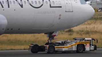 FRANKFURT AM MAIN, GERMANY JULY 20, 2017 - Lufthansa Airbus 340 D AIFF, Star Alliance livery towing from service. Fraport, Frankfurt, Germany video