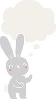 cute cartoon rabbit and thought bubble in retro style vector