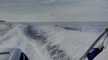 View from the rear of moving speedboat, slow motion, HDR footage video