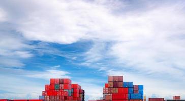 Container logistic. Cargo and shipping business. Container ship for import and export logistic. Container freight station. Logistic industry from port to port. Container at harbor for truck transport. photo