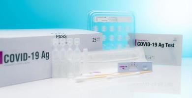Covid 19 antigen self test for nasal swab. Antigen test kit for home use to detection coronavirus infection. Rapid antigen test. Corona virus diagnosis. Medical device for covid-19 antigen test. photo