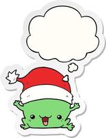 cute cartoon christmas frog and thought bubble as a printed sticker