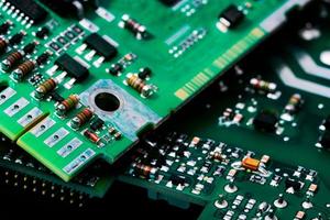 Electronic circuit board. Semiconductor motherboard circuit board technology. Mainboard of computer. Integrated semiconductor microchip on green circuit board. Hi-tech industry and computer science. photo