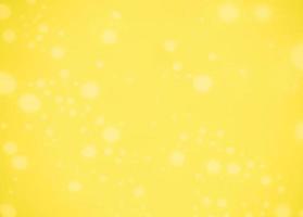 Blurred yellow texture background with white dotted pattern. Yellow bright color background. photo