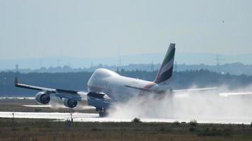 FRANKFURT AM MAIN, GERMANY JULY 20, 2017 - Emirates SkyCargo Boeing 747 OO THD approaching before landing at 25C after rain. Fraport, Frankfurt, Germany video