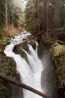 Waterfall in forest photo