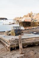 Wooden dock at low tide photo