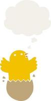 cartoon hatching bird and thought bubble in retro style vector