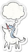 cartoon unicorn and thought bubble as a distressed worn sticker vector