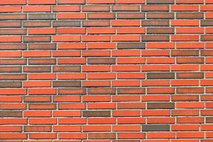 Old brick wall. Texture of old weathered brick wall panoramic background photo