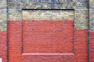 Old brick wall. Texture of old weathered brick wall panoramic background photo