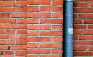 Old brick wall. Texture of old weathered brick wall panoramic background photo