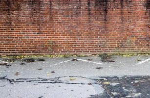 Old brick wall. Texture of old weathered brick wall panoramic background photo