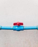 Red plastic valve. photo