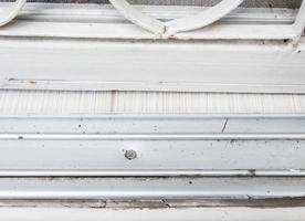 Metal rail of the sliding glass door. photo