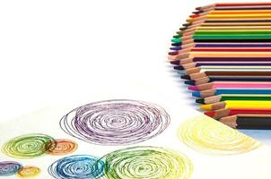 Colour pencils isolated on white background photo