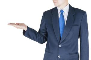 Businessman is open his palm upwards to present something. Photo includes clipping path.