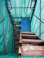 Old staircase of the high scaffolding. photo