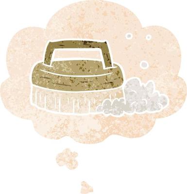 cartoon scrubbing brush and thought bubble in retro textured style