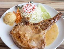 Pork chops steak with the gravy sauce. photo